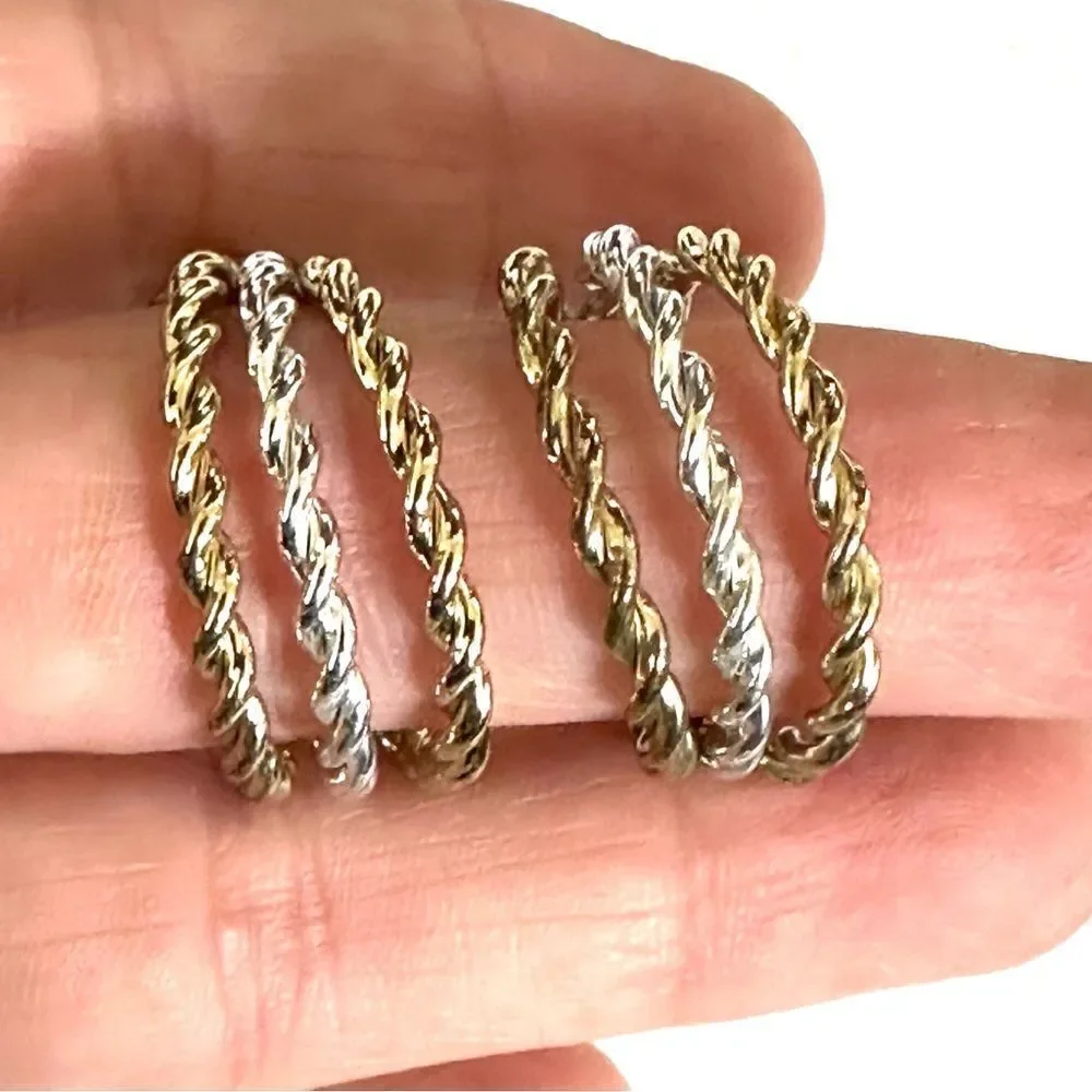 NWH silver and gold tone clip on earrings
